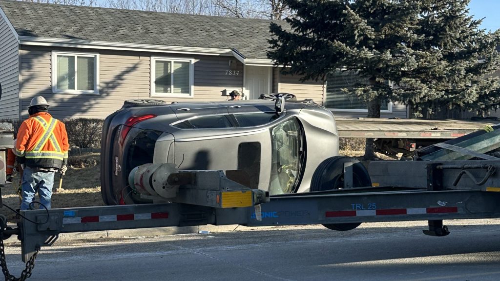 A vehicle flipped into its side in NW Calgary following a hit-and-run crash on Jan. 21, 2026. (CityNews/Max Latimer)