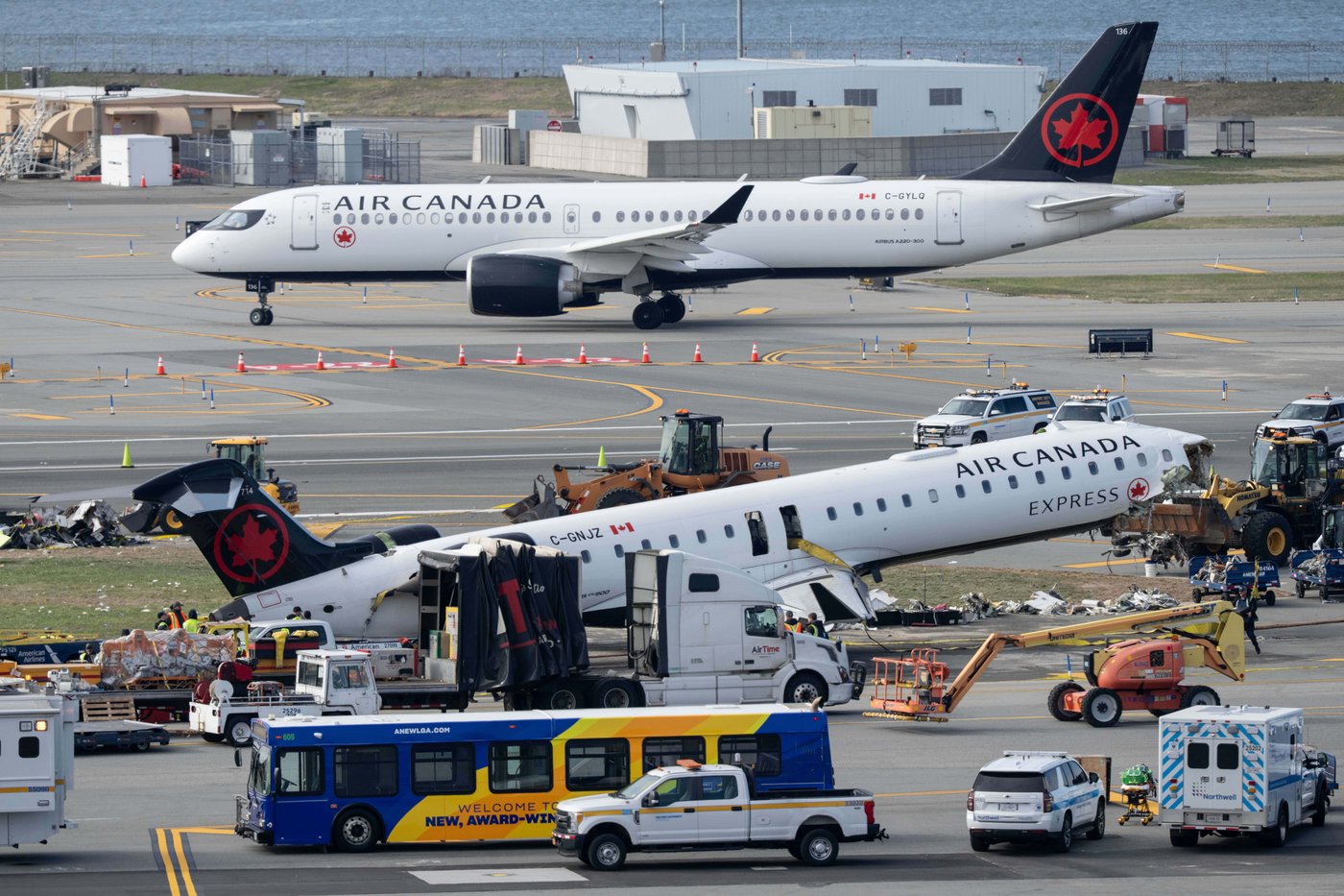 Mangled Air Canada plane in LaGuardia crash towed from runway; most injured passengers leave hospital