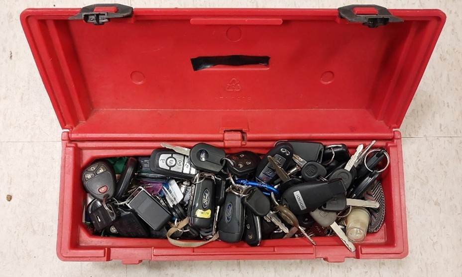 Key fobs, stolen bikes and vehicles, guns, drugs, and gaming cards were among the items seized during a search connected to an ongoing break-and-enter investigation in Calgary. (Calgary police/images)