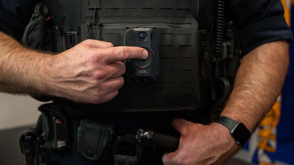 A Delta Police Department officer demonstrates recording on a body camera during a news conference from the B.C. Association of Chiefs of Police about implementing body-worn cameras for officers, in Surrey, B.C., on Thursday, Jan. 11, 2024. THE CANADIAN PRESS/Ethan Cairns
