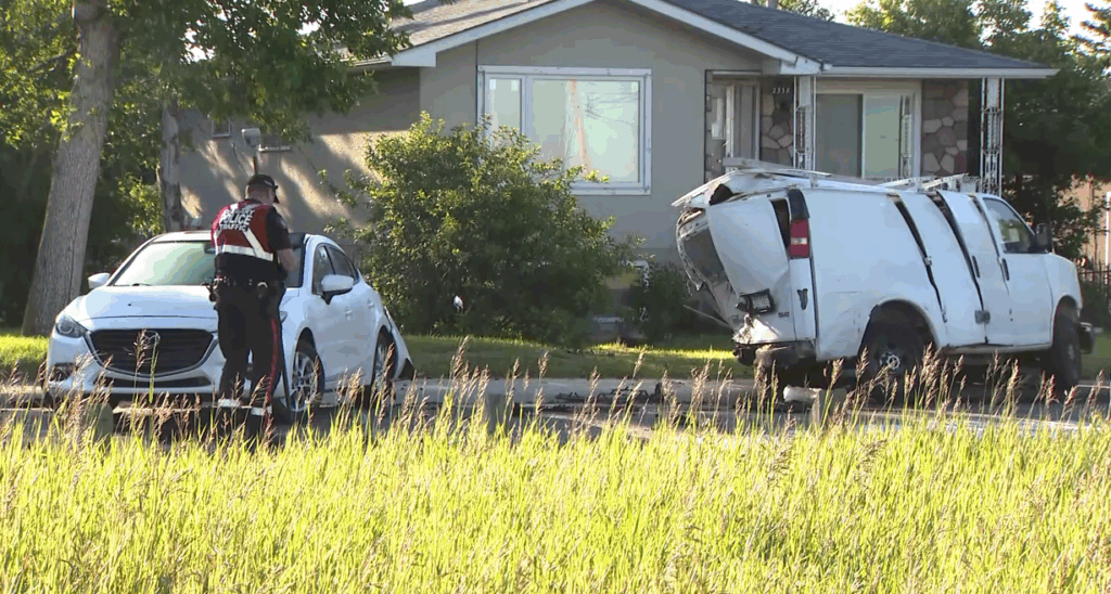 An officer investigates a vehicle involved in a multi-vehicle crash, when one drove into three parked ones early in the Southview area in southeast Calgary on Wednesday, June 24, 2026