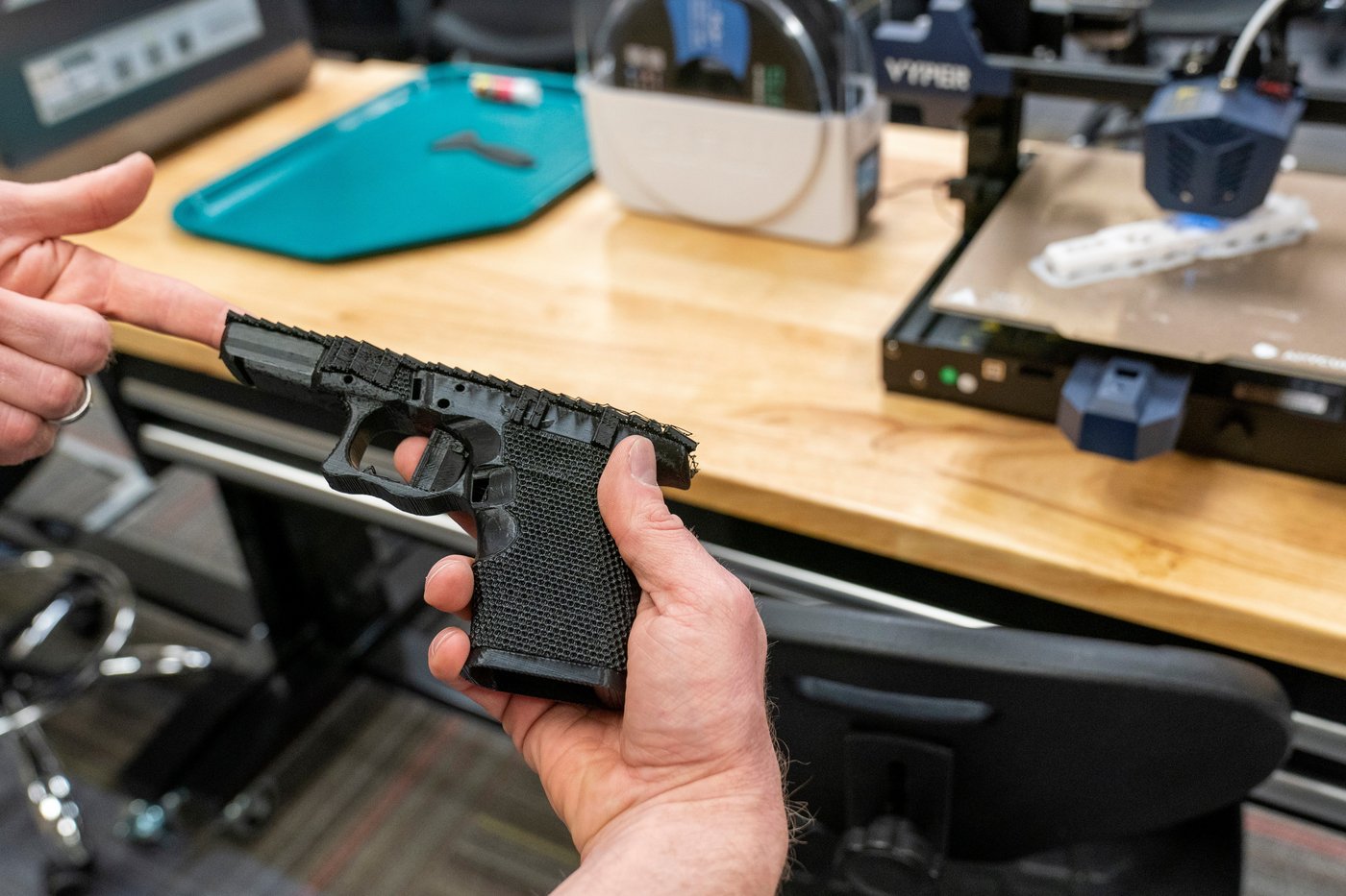 Some people are making guns with 3D printers. A new U.S. law seeks to cancel their print jobs