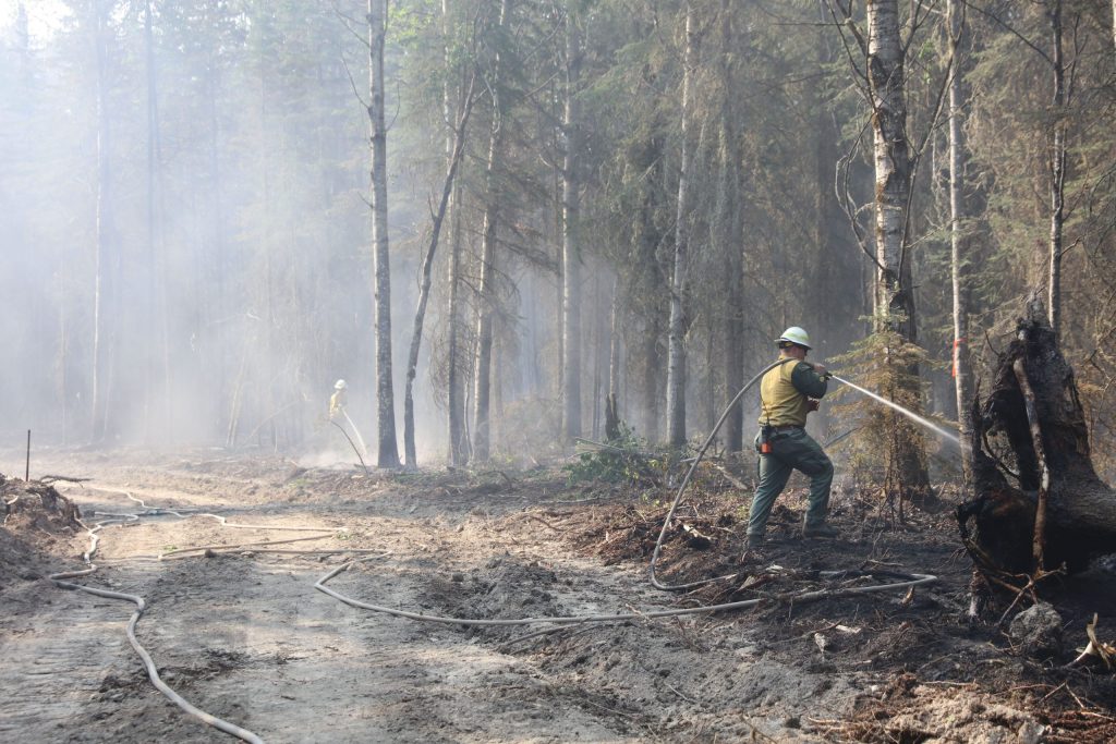 Firefighters working on the Sturgeon Lake Complex wildfire in the Grande Prairie Forest Area in May 2023