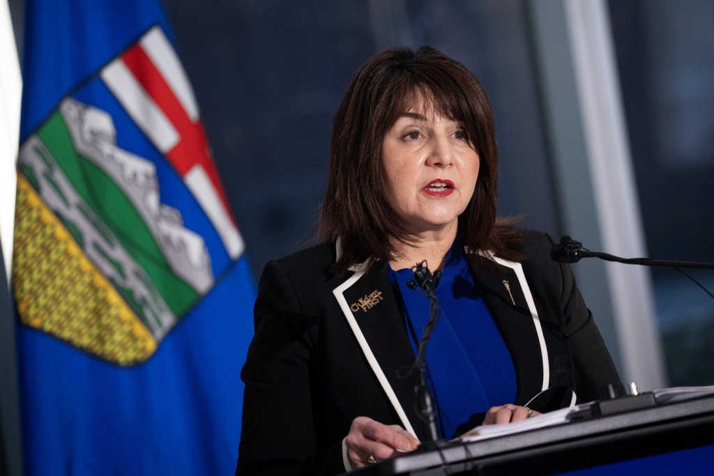 Who will handle what with public health in Alberta?